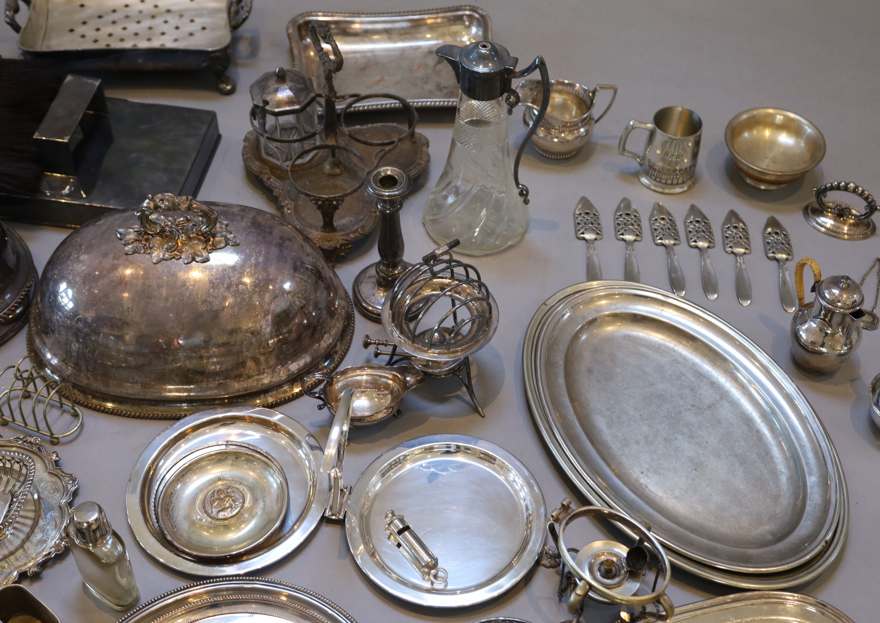 A collection of assorted plated wares,